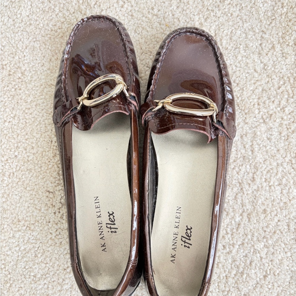 Anne Klein Glossy Brown Loafers with Gold Accent